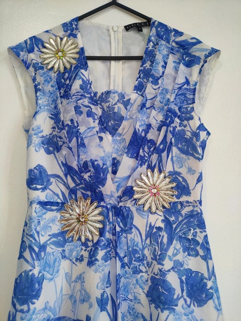 Gucci Floral Dress (Category: Dresses) located in Quezon City. Submitted by maxsab (Listing ID 1464043080, Image 2). Description: - Blue and white floral pattern with silver applique - Back zipper - Above the knee length.