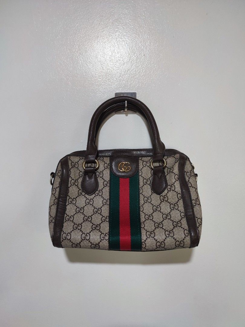 Gucci Mini Ophidia Boston Bag (Category: Luxury Bags & Wallets) located in Mangaldan. Submitted by thrift.mo.ba (Listing ID 1463968332, Image 1). Description: Gucci Mini Ophidia Boston Bag no sling with flaws.