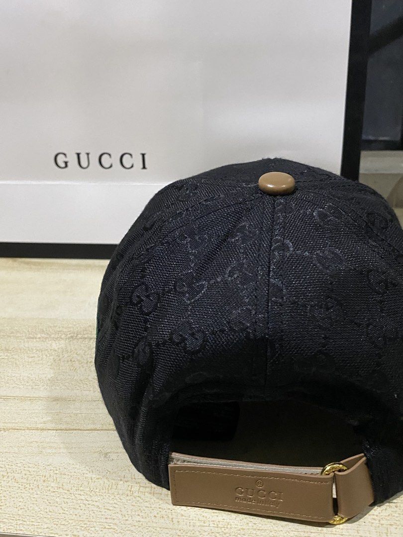 Gucci Original GG Canvas Baseball Cap (Category: Caps & Hats) located in Quezon City. Submitted by carlos132 (Listing ID 1464123161, Image 3). Description: - Iconic Gucci cap with GG monogram pattern - Features classic green and red stripe detail - Made in Italy - Genuine leather trim - Adjustable strap for a comfortable fit - Comes with original Gucci dust bag - Perfect accessory to elevate any look.