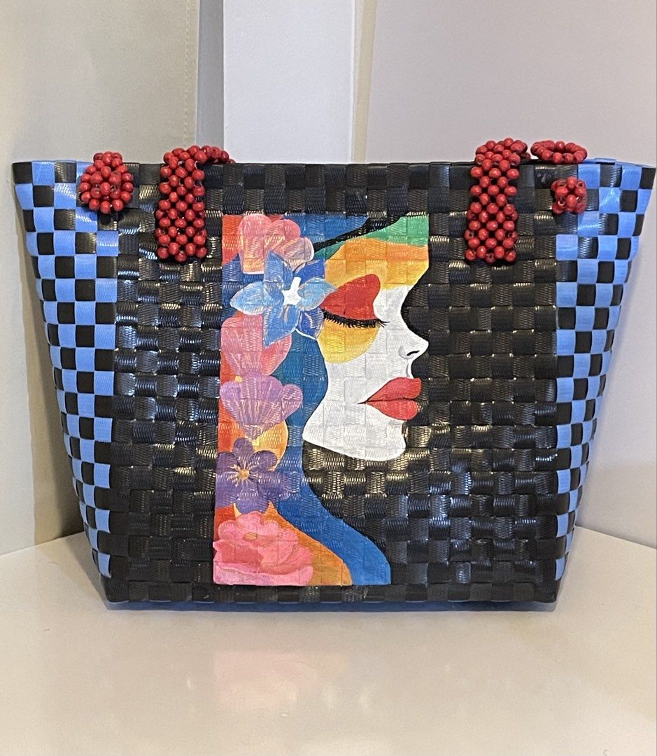 Hand crafted bayong bag (Category: Shoulder Bags) located in Muntinlupa City. Submitted by declutter.clubph (Listing ID 1464068415, Image 1). Description: body material: durable recycled plastic closure: beaded loop closure handles: multi-strand hand beaded shoulder strap details: hand-painted line art. .