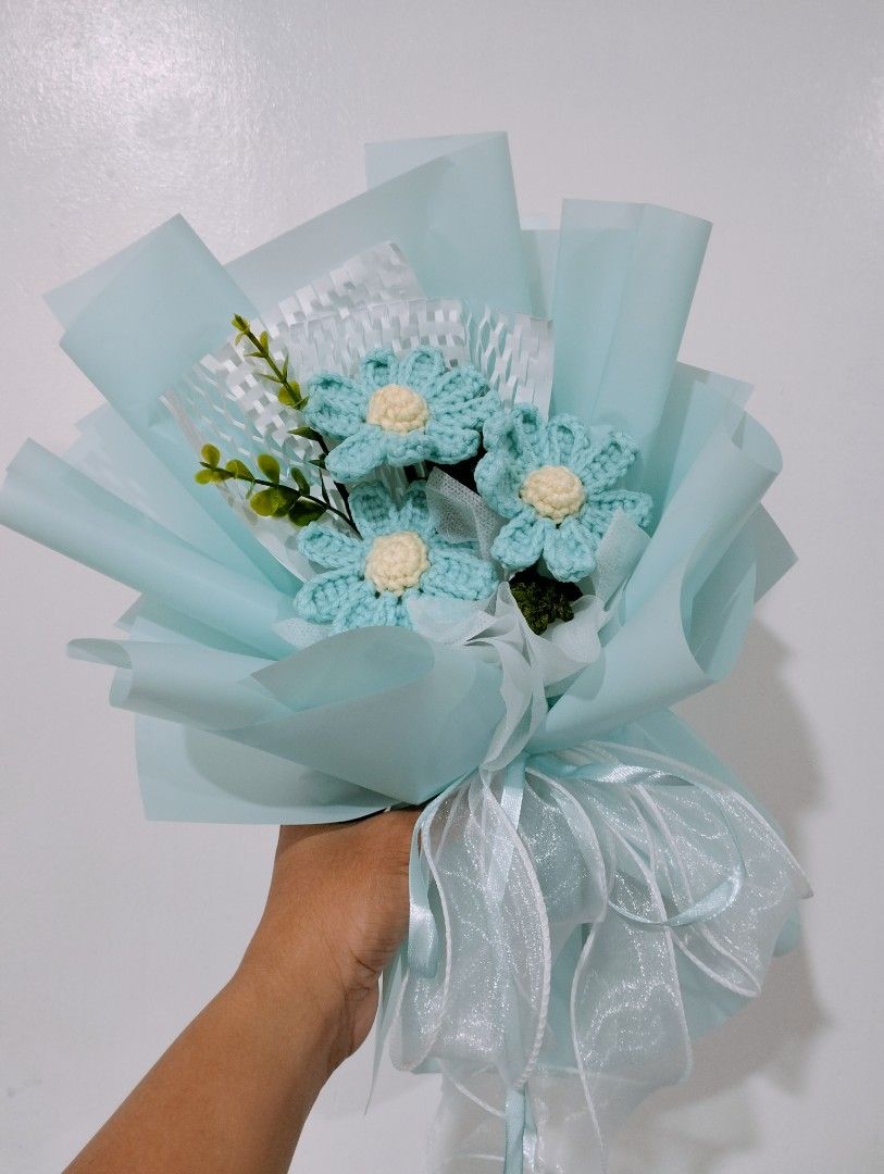 Handmade Crocheted Flower Bouquets - Various Colors (Category: Flowers & Bouquets) located in Dasmarinas. Submitted by swiftmoon.d0bca8 (Listing ID 1464072547, Image 2). Description: Beautiful handmade crocheted flower bouquets. Available in red roses, blue daisies, pink roses, and purple tulips. Each bouquet is carefully crafted and wrapped. Makes a lovely gift or decoration. Perfect for birthdays, anniversaries, or just because. Get yours today