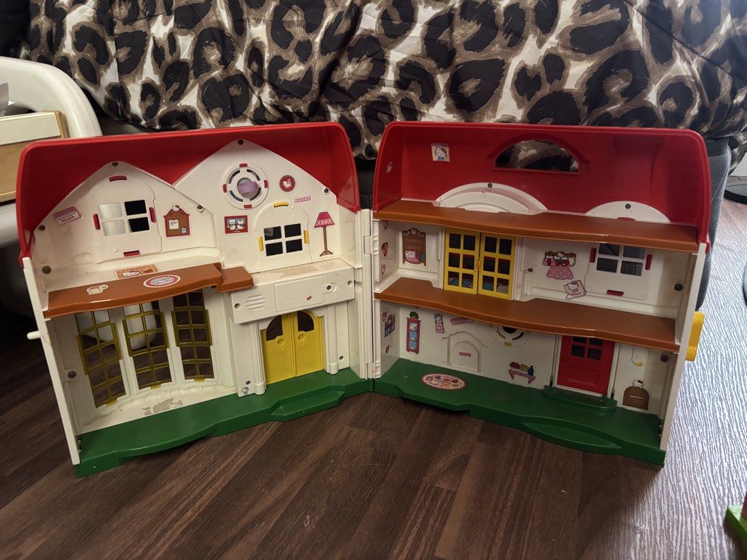 Hello Kitty Foldable Dollhouse (Category: Kids Toys) located in Imus. Submitted by preloved_by_chlea (Listing ID 1463952913, Image 3). Description: - Adorable Kitty Foldable Dollhouse - Opens up to reveal multiple rooms and levels - Includes miniature furniture pieces - Doors open and close for interactive play - Encourages imaginative play - A must-have for any Kitty enthusiast!.