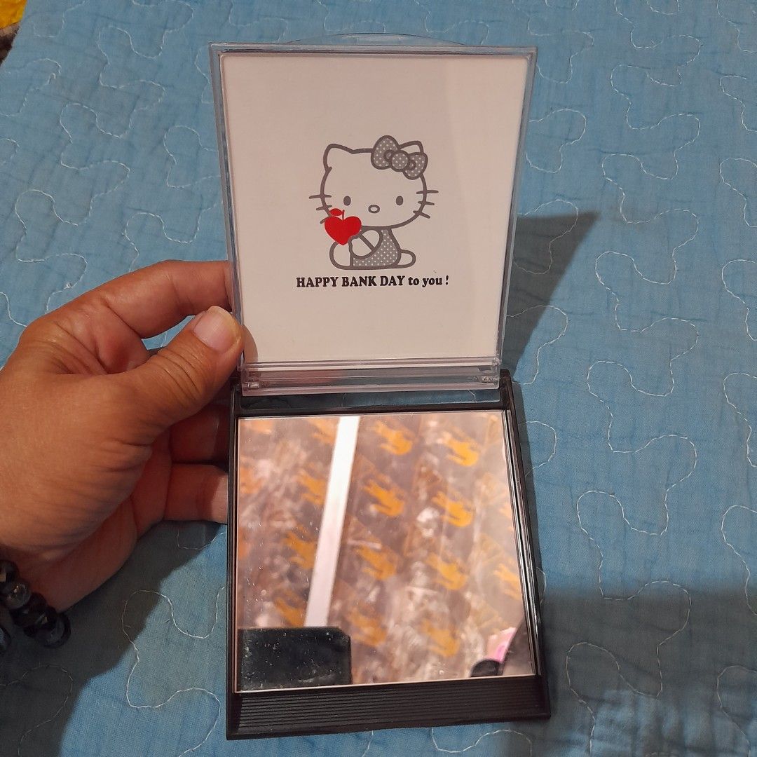 Hello Kitty "I Apple" Mirror Compact CD Case (Category: Mirrors) located in Bocaue. Submitted by marajapansurplus (Listing ID 1463956197, Image 2). Description: - Adorable Kitty mirror compact. - Includes a clear mirror inside. - Ideal for Kitty enthusiasts. .