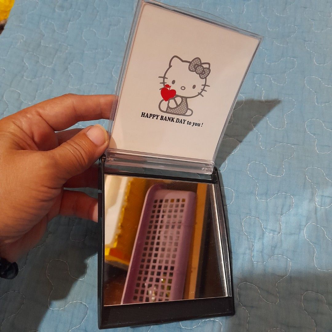 Hello Kitty "I Apple" Mirror Compact CD Case (Category: Mirrors) located in Bocaue. Submitted by marajapansurplus (Listing ID 1463956197, Image 3). Description: - Adorable Kitty mirror compact. - Includes a clear mirror inside. - Ideal for Kitty enthusiasts. .