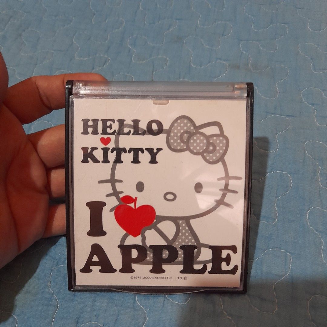 Hello Kitty "I Apple" Mirror Compact CD Case (Category: Mirrors) located in Bocaue. Submitted by marajapansurplus (Listing ID 1463956197, Image 1). Description: - Adorable Kitty mirror compact. - Includes a clear mirror inside. - Ideal for Kitty enthusiasts. .