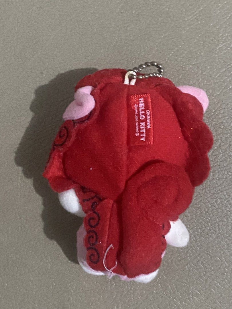 Hello Kitty Lion Dance Plush Keychain (Category: Plushies & Soft Toys) located in Davao. Submitted by hoowans_surplus (Listing ID 1464067690, Image 2). Description: - Adorable Kitty plush keychain. - Features a charming pink lion dance costume. - Comes with a sturdy metal keychain ring. - Ideal accessory for your bags, backpacks, or keys. - Authentic Sanrio product..