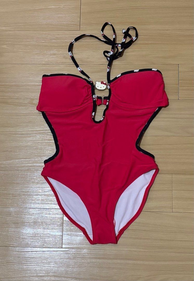 Hello Kitty Red One-Piece Swimsuit Small (Category: Bikinis & Swimsuits) located in Quezon City. Submitted by garagesale2026 (Listing ID 1464117540, Image 1). Description: - Unused, no more tag - Original from Singapore - Halter neck with Hello Kitty face detailing - With a metal Hello Kitty face on the front - Cut-out design on the sides - White lining - Padded.