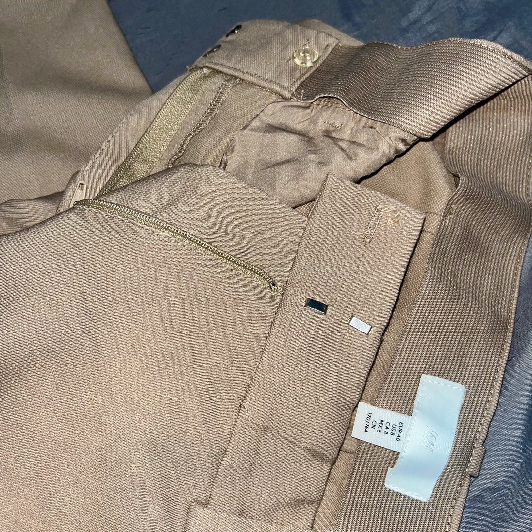 H&M Beige Cigarette Tailored Trouser (Category: Other Bottoms) located in Caloocan City. Submitted by jeansforlessph (Listing ID 1464061847, Image 2). Description: - H&M Beige Tailored Trousers - Straight Leg Fit - Size: 8 (EUR 40) - Versatile: Great for work or casual outfits - Easy to pair with any top - used once or twice only - color may vary Payment via landbank or maya only First to pay Scheduled shipping via jnt or lalamove/grab (buyer wil