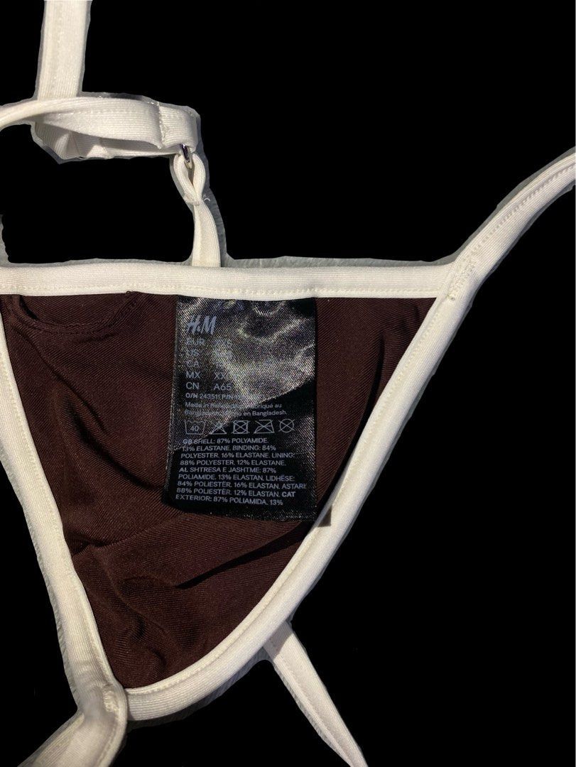 H&M Brown Bikini Top with White Trim (Category: Bikinis & Swimsuits) located in Cavite. Submitted by zyrahramos (Listing ID 1464061482, Image 3). Description: 💋Brand: H&M 💋Color: Brown 💋Style: Bikini Top 💋Size: XXS 💋Details: White trim, ties at neck and back for adjustable fit 💋Occasion: Ideal for beach or pool days 💋Condition: Worn once | like new..