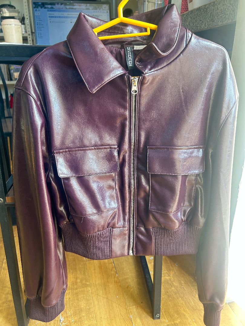 H&M Burgundy Coated Bomber Jacket (Category: Coats, Jackets and Outerwear) located in Caloocan City. Submitted by deklutzsea (Listing ID 1463946967, Image 2). Description: This is essentially pamigay sale due to its original price as you can see in the screenshot and H&M website. It's a gift from a horrible ex; I just wanna get rid of it. It has four pockets on up and on the sides. .