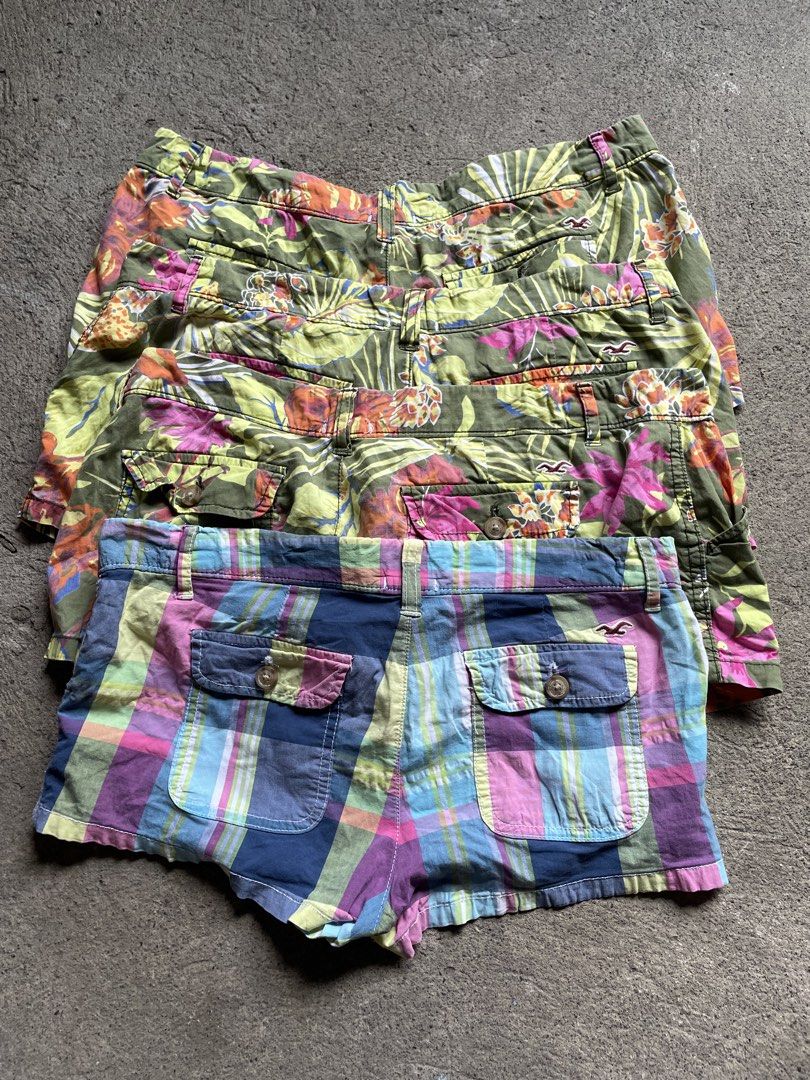 Hollister Shorts Bundle - Floral & Plaid Patterns (Category: Shorts) located in Siniloan. Submitted by rethr1ft (Listing ID 1464013810, Image 1). Description: - Bundle of 2 Hollister shorts - One pair: Green tropical floral print (Size 5) - Second pair: Colorful plaid (pink, blue, yellow) (Size 3) - Both shorts have a bit of stretch - Ideal for summer wear.