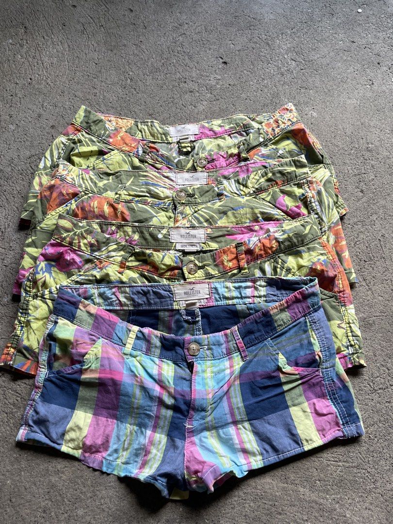 Hollister Shorts Bundle - Floral & Plaid Patterns (Category: Shorts) located in Siniloan. Submitted by rethr1ft (Listing ID 1464013810, Image 2). Description: - Bundle of 2 Hollister shorts - One pair: Green tropical floral print (Size 5) - Second pair: Colorful plaid (pink, blue, yellow) (Size 3) - Both shorts have a bit of stretch - Ideal for summer wear.