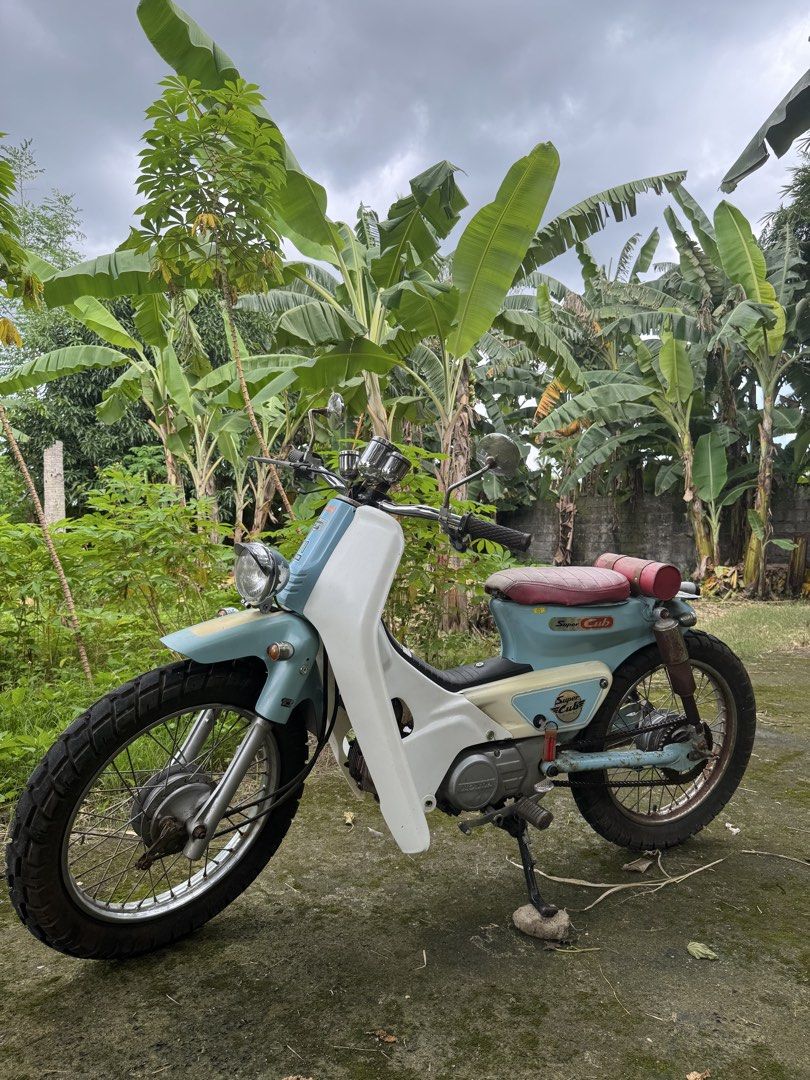 Honda Dream C100 1997 (Category: Motorbikes for Sale) located in Manila. Submitted by gemfinderph (Listing ID 1463991703, Image 3). Description: Classic Honda Super Cub for sale. Light blue and white colorway. This bike has a unique, retro look. It's a great project bike or for someone who loves vintage scooters. Ready for a new owner to take it on the road. Feel free to ask any questions..