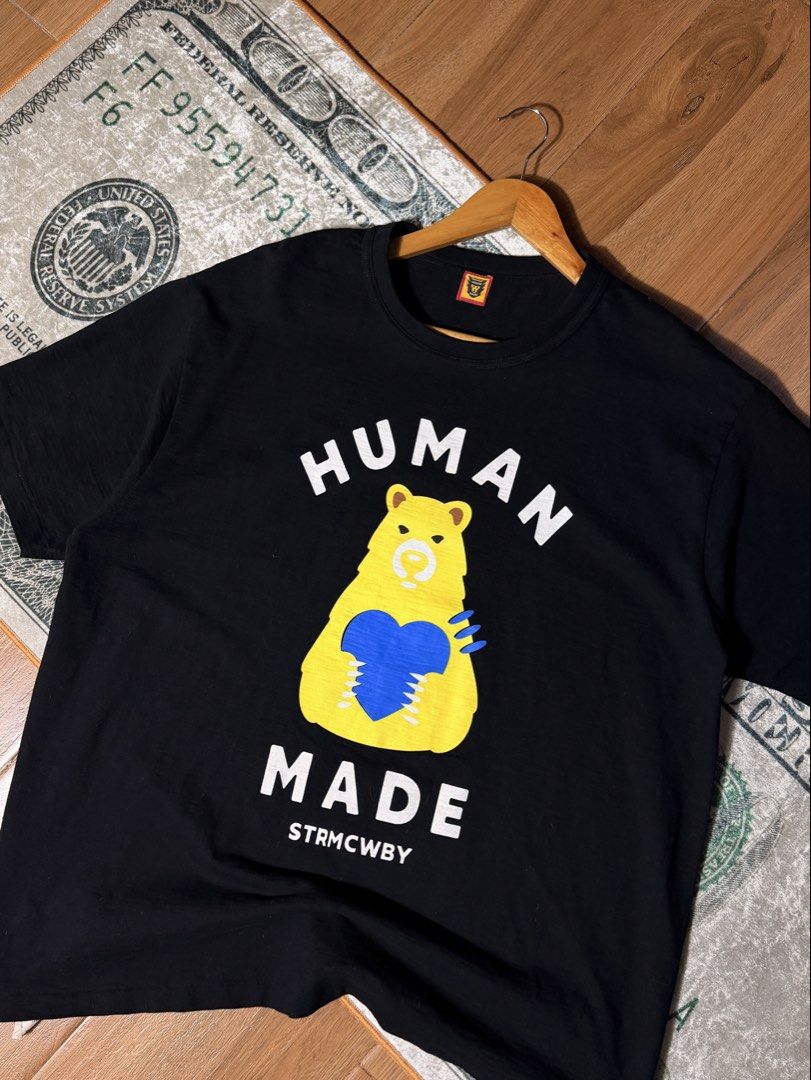 Human made (Category: Tshirts & Polo Shirts ) located in Candelaria. Submitted by ballerthrift796 (Listing ID 1464090805, Image 1). Description: Human made No issue Good condition W- 24 L - 28.