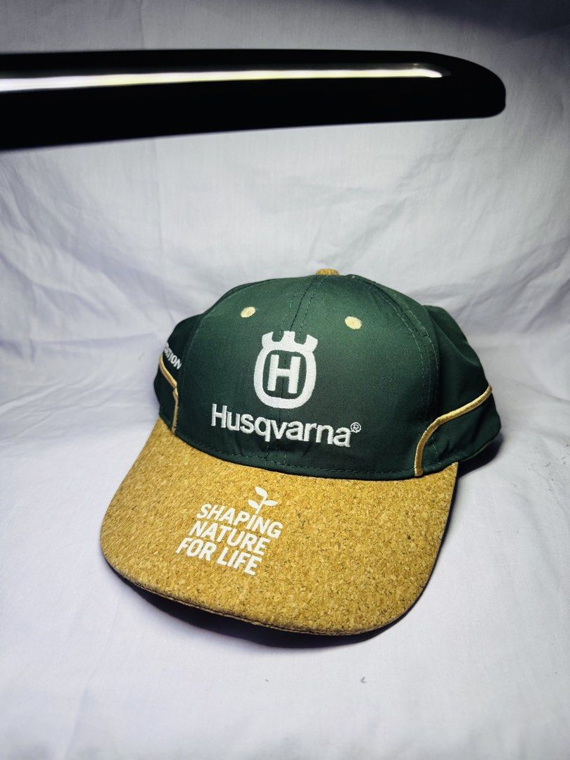 Husqvarna Limited Edition 2022 Cap (Category: Caps & Hats) located in Roxas City. Submitted by patsquarephantz (Listing ID 1463991390, Image 1). Description: - Limited Edition 2022 Husqvarna Cap - Stylish green and cork design - Features iconic Husqvarna logo - Includes 'Shaping Nature For Life' text - Accented with elegant gold trim - A must-have for any Husqvarna enthusiast.