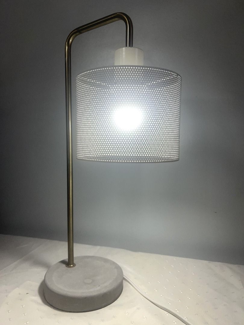 Industrial Modern Table Lamp – Brass Finish & Concrete Base (Category: Lighting) located in Pasig City. Submitted by rehome.studio (Listing ID 1464003754, Image 2). Description: Selling this Modern Industrial Table Lamp with a concrete base and brass-tone frame. It creates a warm, cozy ambiance while adding a touch of understated character to bedrooms, reading corners, side tables, home offices, and thoughtfully curated interiors. Condition: • Fu