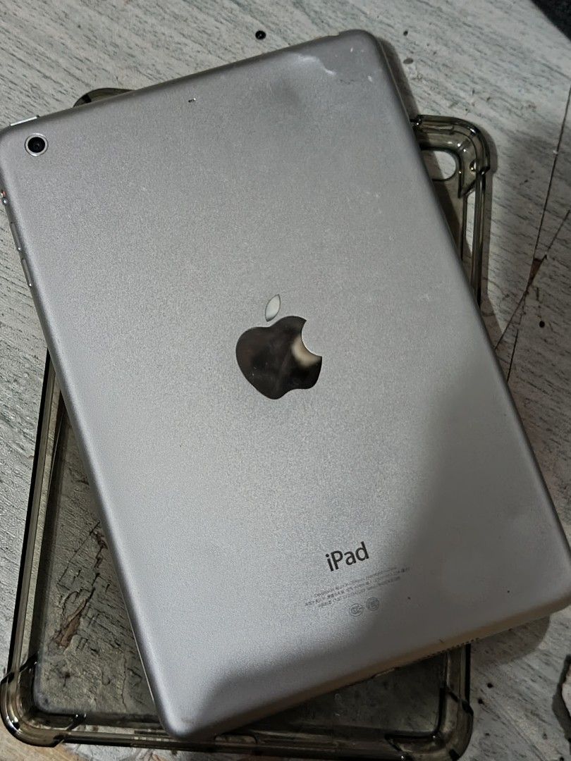 Ipad mini 2 silver (Category: iPad) located in Makati City. Submitted by elirei (Listing ID 1464049861, Image 1). Description: - Silver iPad Mini 2 - 16GB storage capacity - Compact and portable design - Good overall condition with minor signs of wear - Protective case included inclusion: ipad, case and charger. both cam working all buttons working mic working used only for vintage cam, apple music, and netflix (version it can handle) it has ghos