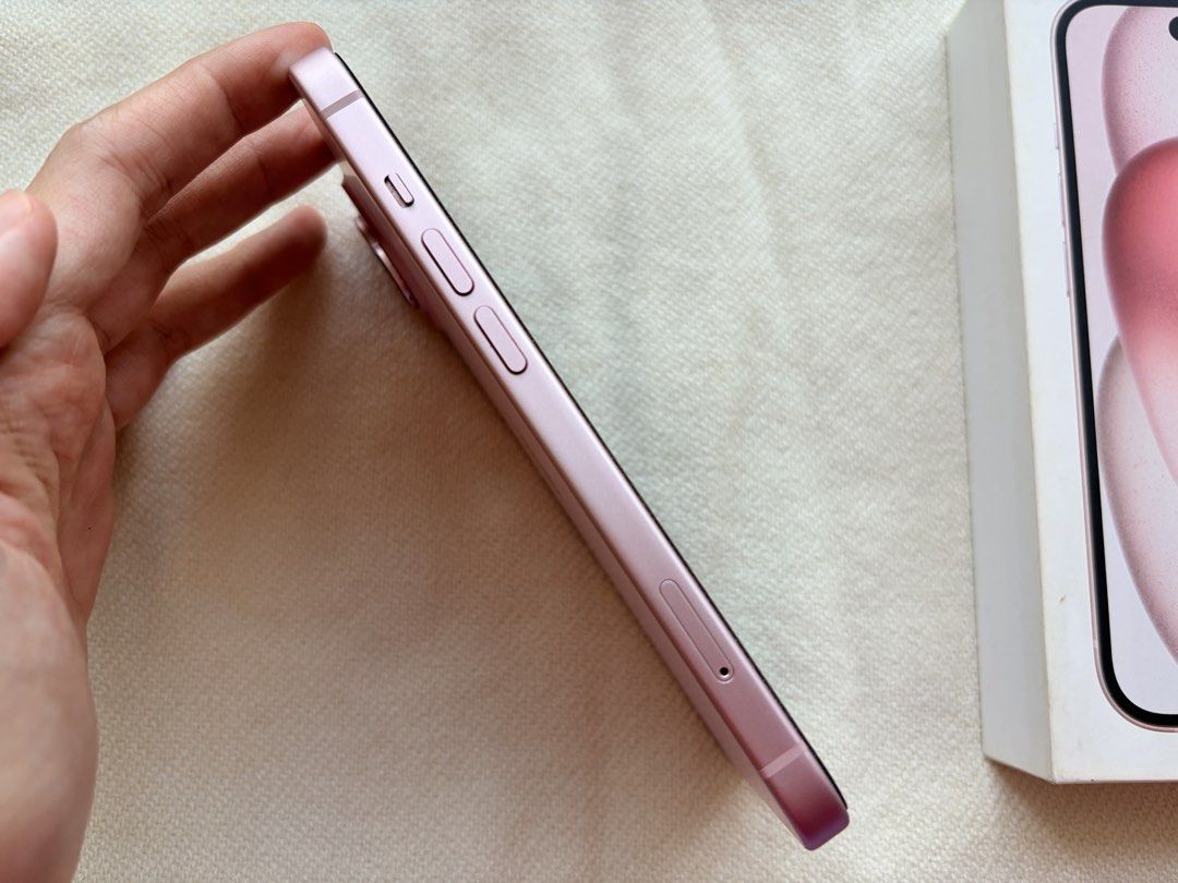 Iphone 15 256 GB Pink (Category: iPhone 15 Series) located in Valenzuela. Submitted by smaespno (Listing ID 1463961528, Image 3). Description: Iphone 15 256GB Pink - No dents, scratches, or physical flaws - Camera, speakers, screen: 100% working - No sim restrictions - Batt health: 76% - First used May 2024 - All parts original, No history of repair Inclusions - Original box - Used original charging cord - Sim ejector Rfs: Upgrading Located at Li