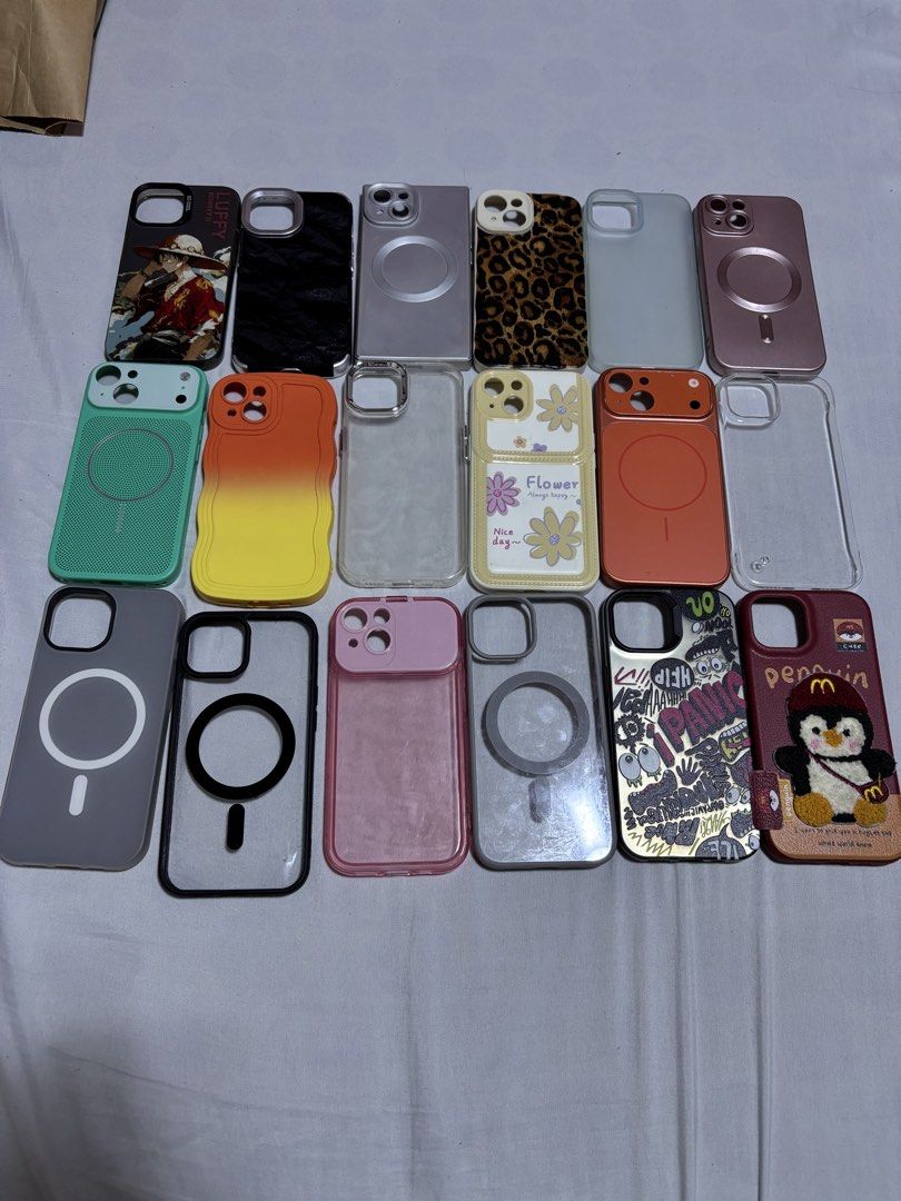 Iphone 15 cases (Category: Cases & Sleeves) located in Pasig City. Submitted by abogadosupremo (Listing ID 1464061961, Image 1). Description: - Variety of iPhone 15 cases - Designs include anime (Luffy), leopard print, floral, solid colors, and clear cases - Some cases feature MagSafe compatibility - Multiple colors and styles to choose from - Ready for immediate shipping - 18pcs, all in na - almost new pa yung iba halos di nagamut - nabili ng si