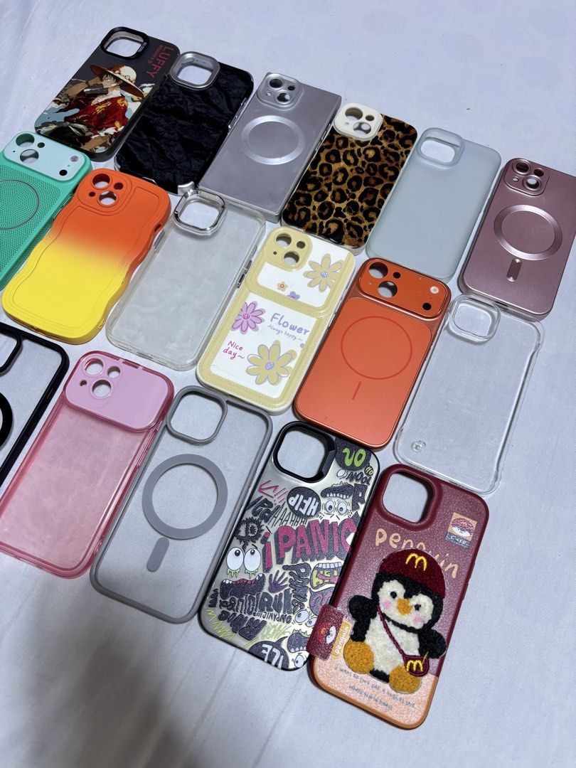 Iphone 15 cases (Category: Cases & Sleeves) located in Pasig City. Submitted by abogadosupremo (Listing ID 1464061961, Image 2). Description: - Variety of iPhone 15 cases - Designs include anime (Luffy), leopard print, floral, solid colors, and clear cases - Some cases feature MagSafe compatibility - Multiple colors and styles to choose from - Ready for immediate shipping - 18pcs, all in na - almost new pa yung iba halos di nagamut - nabili ng si