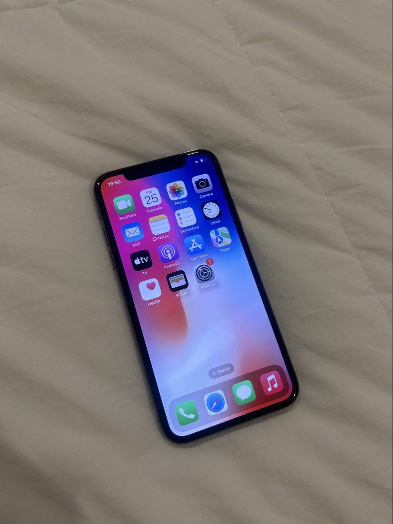 iphone X 256GB (Category: iPhone X Series) located in Manila. Submitted by carlosmiles016 (Listing ID 1464048297, Image 3). Description: This phone was passed down from my Aunt when she left to go abroad. She bought this unit back in early 2018 in Japan. Im selling this because I already have a phone and need cash right now. All parts are original and have never been serviced. Original screen Original Battery (at 80% health) Working Face ID Worki
