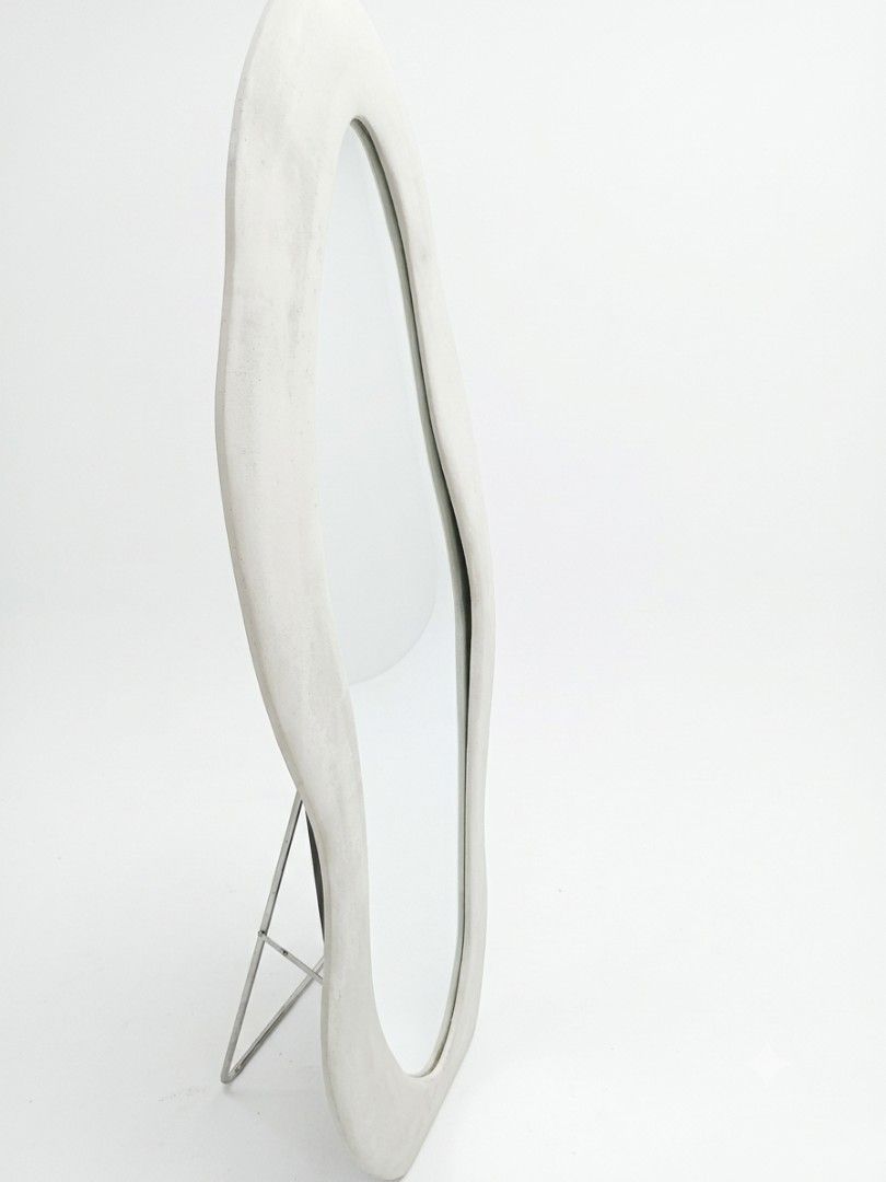 Irregular Shaped Mirror with Stand (Category: Mirrors) located in Manila. Submitted by jules_preloved (Listing ID 1463978856, Image 1). Description: - Unique irregular shaped mirror - Includes a sturdy metal stand for easy display - Ideal for vanity tables or as a decorative accent - Adds a modern aesthetic to any space - Approximate dimensions: 160 tall .