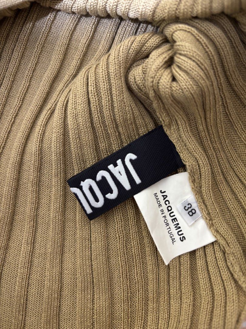 Jacquemus Ribbed Knit Polo Top Size 38 (Category: Sleeveless) located in Trece Martires City. Submitted by jaynetampo60212 (Listing ID 1464056277, Image 3). Description: - Brand: Jacquemus - Style: Ribbed knit polo top - Color: Brown - Neckline: V-neck with collar - Sleeves: Short with lettuce hem - Size: 38 - Origin: Made in Portugal - Versatility: Perfect for dressing up or down -10/10 color rate -best fir for medium- large frames -stretch fabr