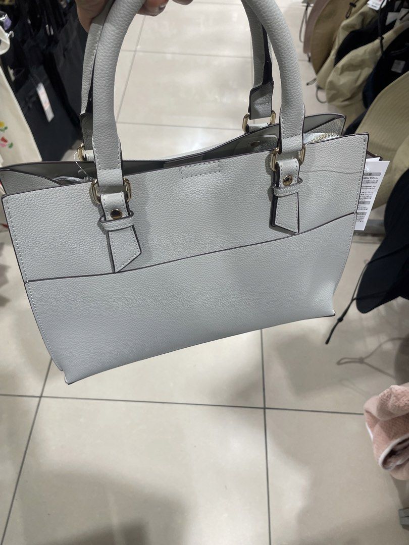 Japan brand office/work bag (Category: Shoulder Bags) located in Cabuyao City. Submitted by wakahatana (Listing ID 1463964858, Image 1). Description: I color gray white. Light weight. Mark down coz no shoulder strap. .