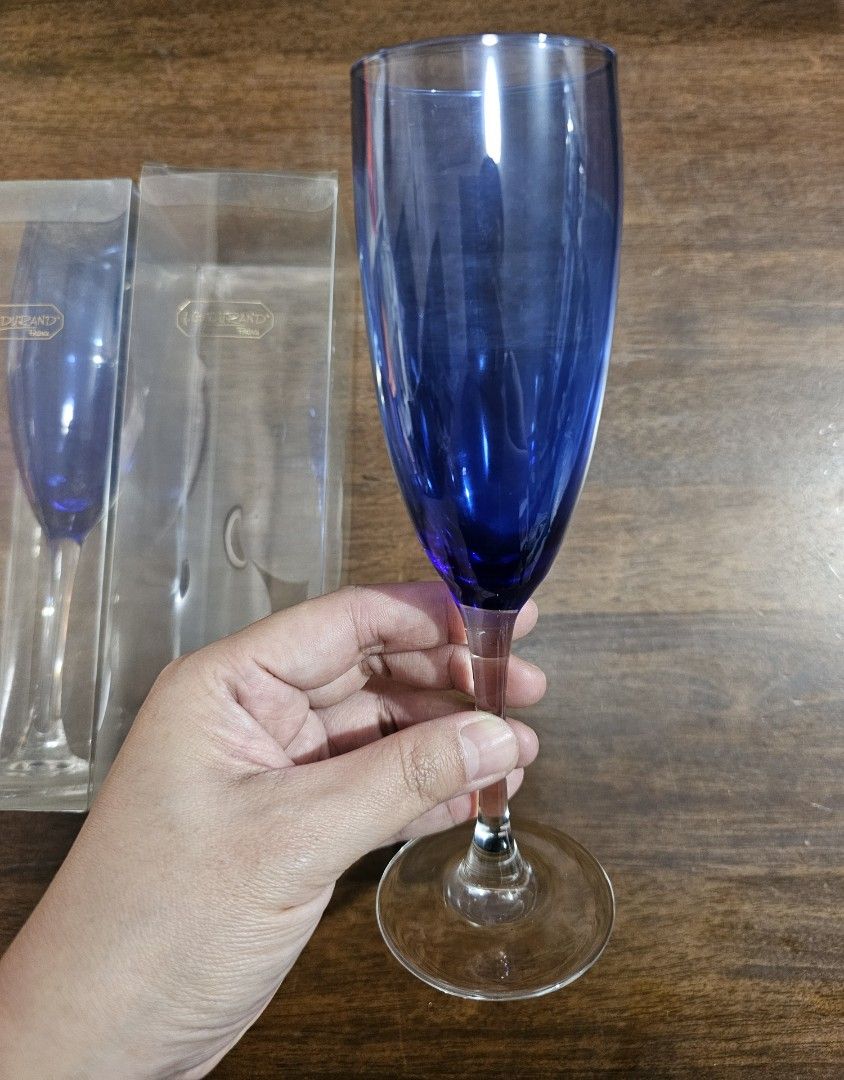 J.G. DURAND Champagne Flute - 2 pcs (Category: Dinnerware & Cutlery) located in Quezon City. Submitted by senyoramaria (Listing ID 1464000195, Image 1). Description: J.G. DURAND (Maker of Crystal d'Arques) Made in France Champagne Flute Cobalt blue and clear stem 2 inches rim diameter 7.75 inches tall Set of 2 Acetate box..