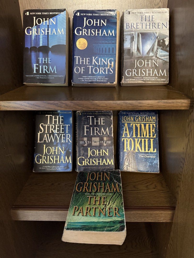 John Grisham Set (MMPB) (Category: Storybooks) located in Rodriguez. Submitted by bmade08 (Listing ID 1464089761, Image 1). Description: 7 John Grisham MMPB for 200 set - Titles include: 2 pcs ‘The Firm', 'The King of Torts', 'The Brethren', 'A Time to Kill', 'The Street Lawyer', 'The Partner' - Books are pre-loved with some wear on covers and spines Rfs: Need funds + decluttering.