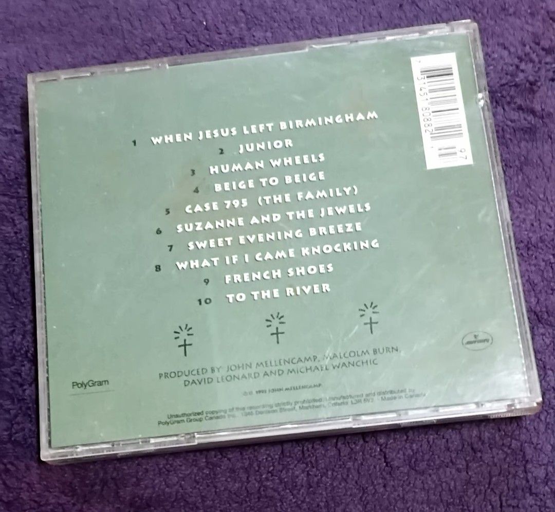 John Mellencamp Human Wheels CD (Category: CDs & DVDs) located in Quezon City. Submitted by dancatz (Listing ID 1464066233, Image 3). Description: □ P 200.00 - John Mellencamp's Human Wheels album on CD - Includes 10 tracks - Notable songs: 'When Jesus Left Birmingham', 'To The River' - Produced by John Mellencamp, Malcolm Burn, David Leonard, and Michael Wanchic - Made in Canada - A great addition to any music collection LFB Seller's location : 