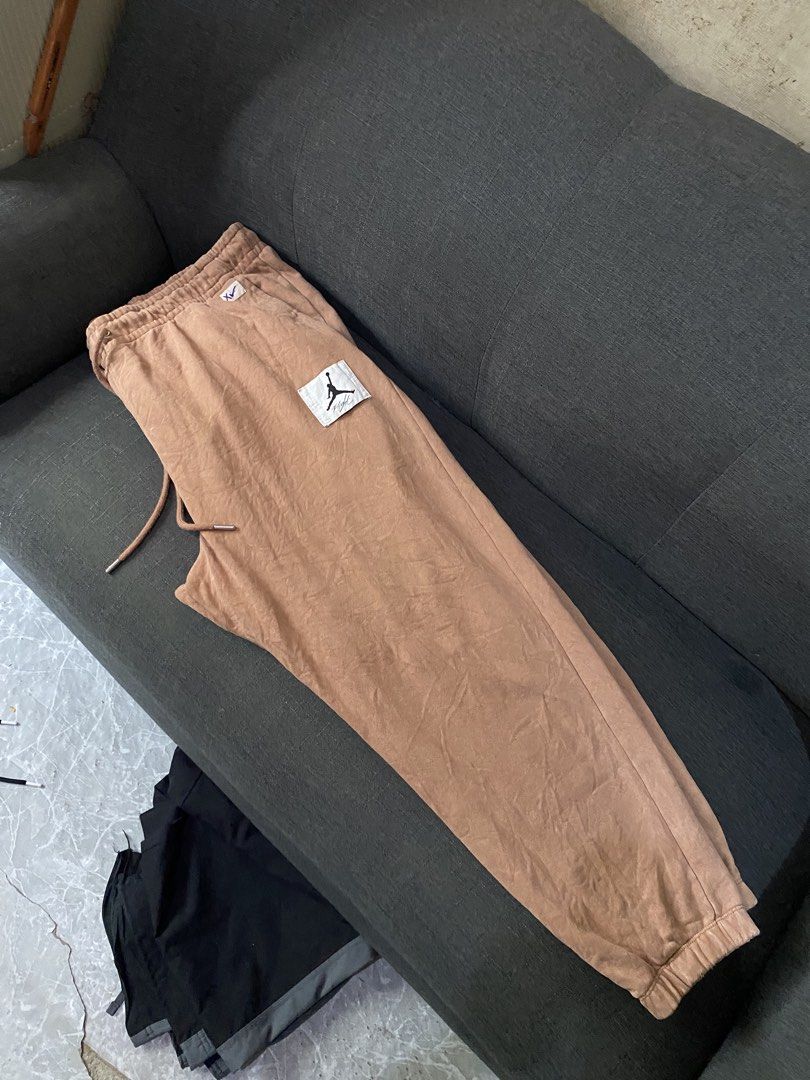 Jordan Flight Jogger Sweatpants Brown (Category: Joggers) located in Bulacan. Submitted by _myarchive (Listing ID 1463996719, Image 2). Description: - Authentic Brown Jordan sweatpants - Features iconic Jumpman logo patch -may parang mga dot white sya - Comfortable elastic waistband with adjustable drawstring - Made from 100% premium cotton - Ideal for everyday casual wear or athletic training -dimes 38 adjsutable can fit 30-38 lwngth 37 .