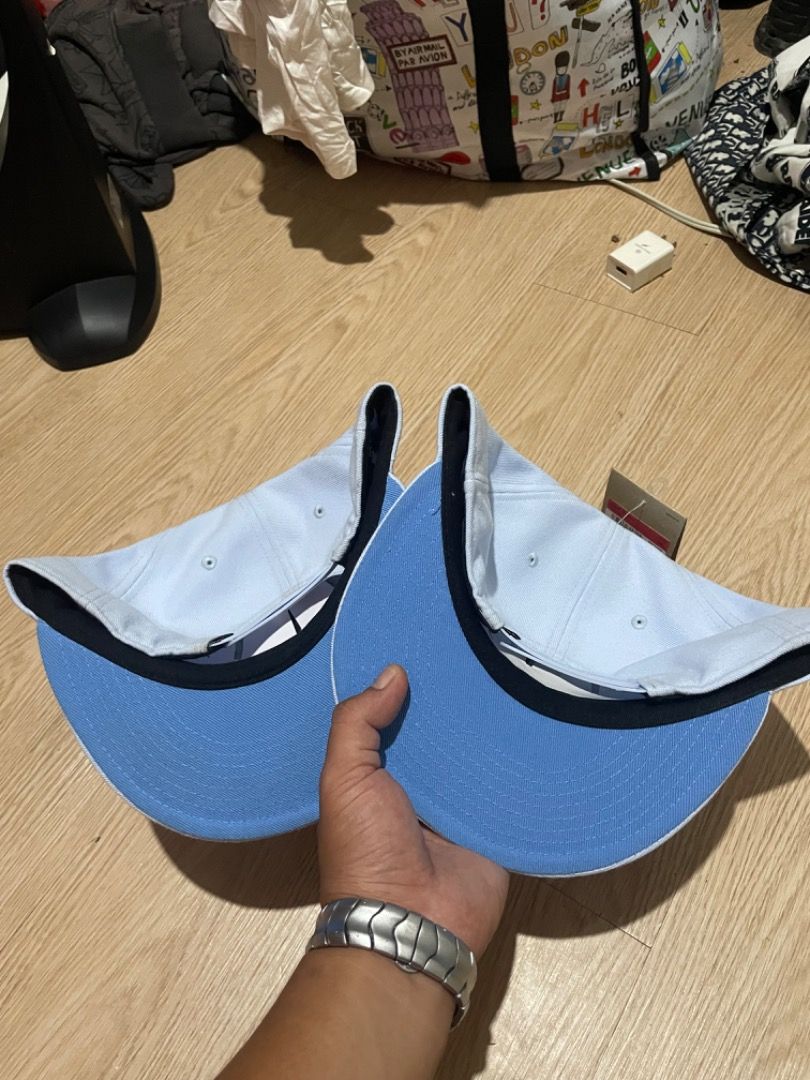 Jordan Snapback Caps (2 pcs) (Category: Caps & Hats) located in Sorsogon. Submitted by solayram0114595 (Listing ID 1464085315, Image 2). Description: - Set of 2 Jordan snapback caps - Color: Light blue with white Jumpman logo - Size: One size fits all (adjustable strap at the back) - Condition: Brand new with tags attached - Ideal for: Casual wear, sports, or completing your streetwear look.