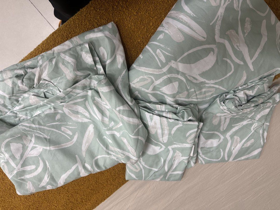 Joyce & Diana Twin Bedding Set - Sage Green Leaf Print (Category: Bedding & Towels) located in Marikina City. Submitted by declutterwithyouandme (Listing ID 1464033738, Image 2). Description: - Joyce & Diana twin size bedding - Sage green and white abstract leaf print - Made with Geko-Tex certified fabric - Soft and comfortable material - Perfect for a bedroom refresh.
