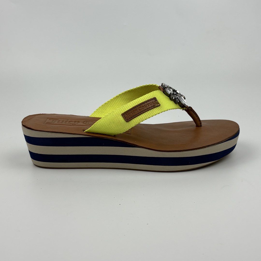 Juicy Couture Embellished Wedge Flip Flops (Category: Flats & Sandals) located in Bacolod City. Submitted by cast.archives (Listing ID 1463965229, Image 2). Description: Juicy Couture Embellished Wedge Flip Flops Size: 37-38 Condition: Excellent Flaw: None.