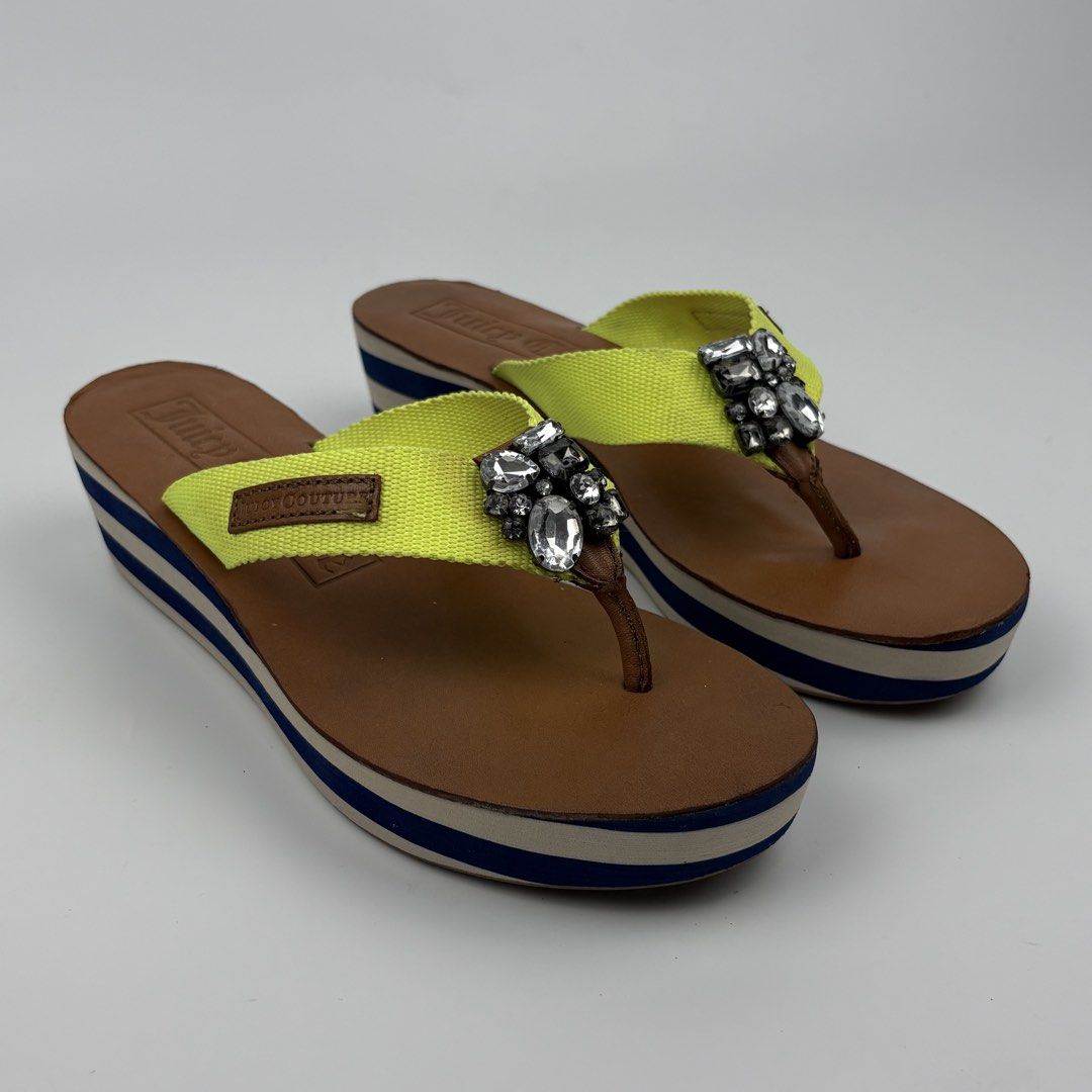 Juicy Couture Embellished Wedge Flip Flops (Category: Flats & Sandals) located in Bacolod City. Submitted by cast.archives (Listing ID 1463965229, Image 1). Description: Juicy Couture Embellished Wedge Flip Flops Size: 37-38 Condition: Excellent Flaw: None.