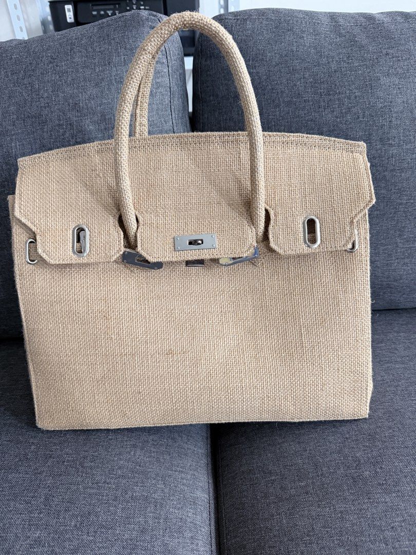 Jute birkin tote bag (Category: Tote Bags) located in Quezon City. Submitted by MissusB (Listing ID 1463951156, Image 1). Description: Eto na! Yours na ito, - Natural jute tote bag - Secure front lock closure - Comfortable top handles for carrying - Interior zippered pocket for essentials - Spacious main compartment - Ideal for everyday use or beach trips.