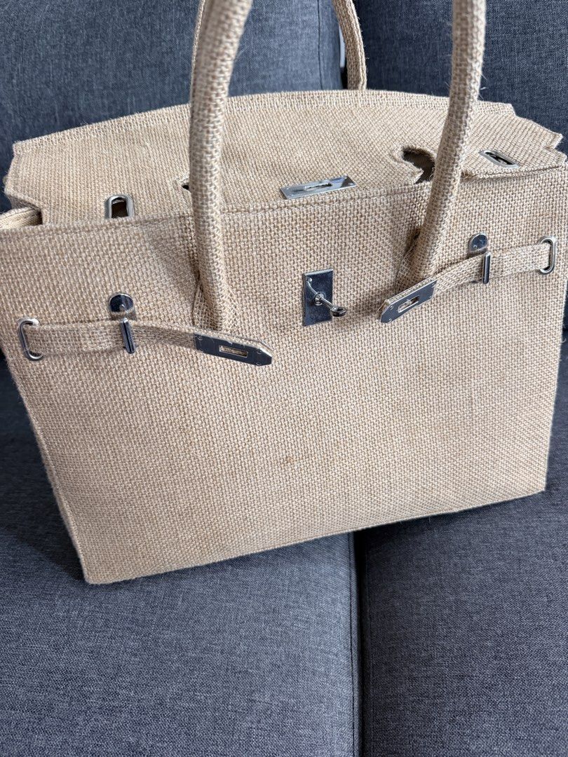 Jute birkin tote bag (Category: Tote Bags) located in Quezon City. Submitted by MissusB (Listing ID 1463951156, Image 2). Description: Eto na! Yours na ito, - Natural jute tote bag - Secure front lock closure - Comfortable top handles for carrying - Interior zippered pocket for essentials - Spacious main compartment - Ideal for everyday use or beach trips.