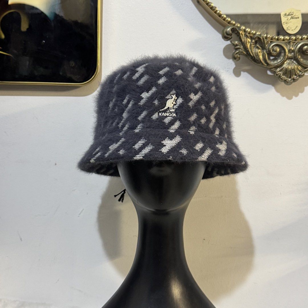 Kangol Angora Blend Bucket Hat (Category: Hats & Beanies) located in Rizal. Submitted by houseofbell (Listing ID 1464117413, Image 3). Description: - Brand: Kangol - Style: Bucket Hat - Color: Dark Grey with White Pattern - Material: Angora Blend (fuzzy texture) - Size: L Brandnew with tag.