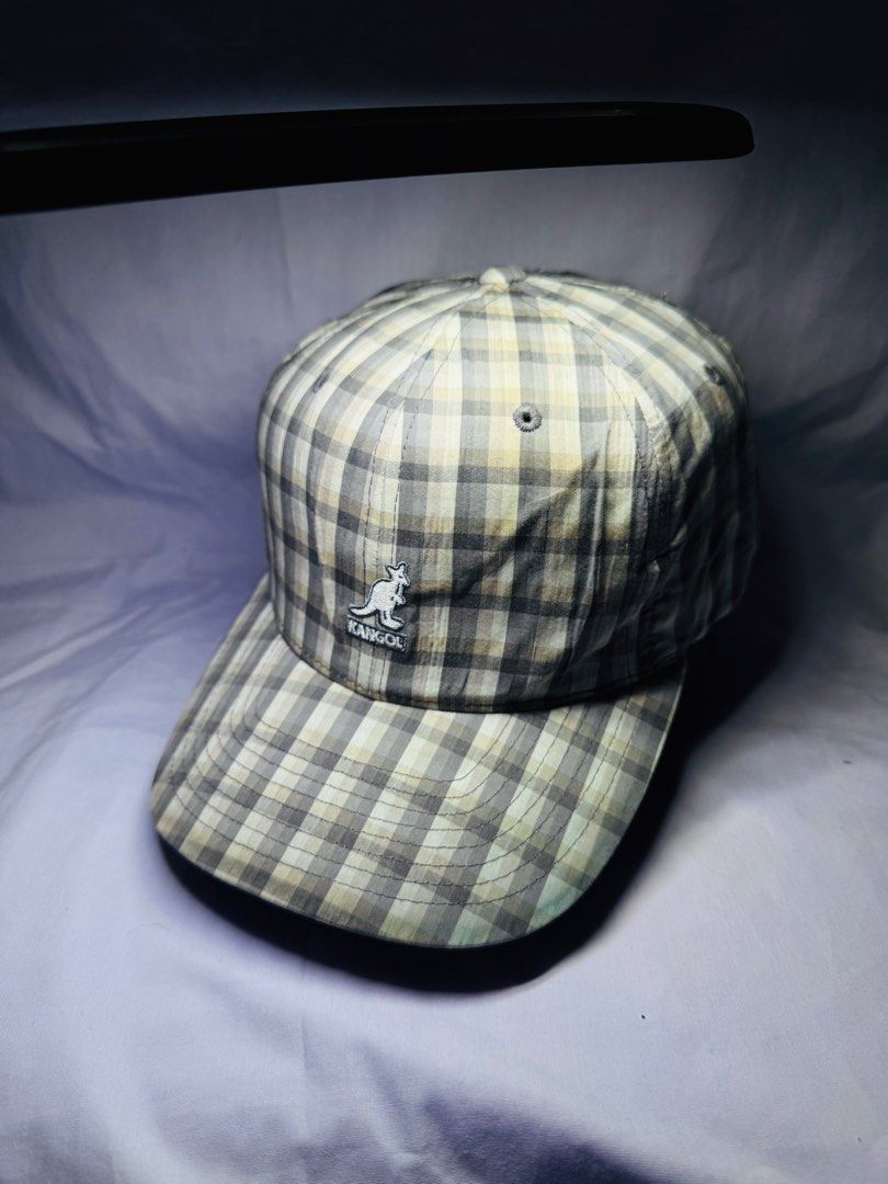 Kangol Plaid Baseball Cap (Category: Caps & Hats) located in Roxas City. Submitted by patsquarephantz (Listing ID 1463992663, Image 1). Description: - Classic Kangol cap - Stylish plaid pattern - Iconic embroidered kangaroo logo - Adjustable strap for a perfect fit - Versatile for casual wear - Complements various outfits.