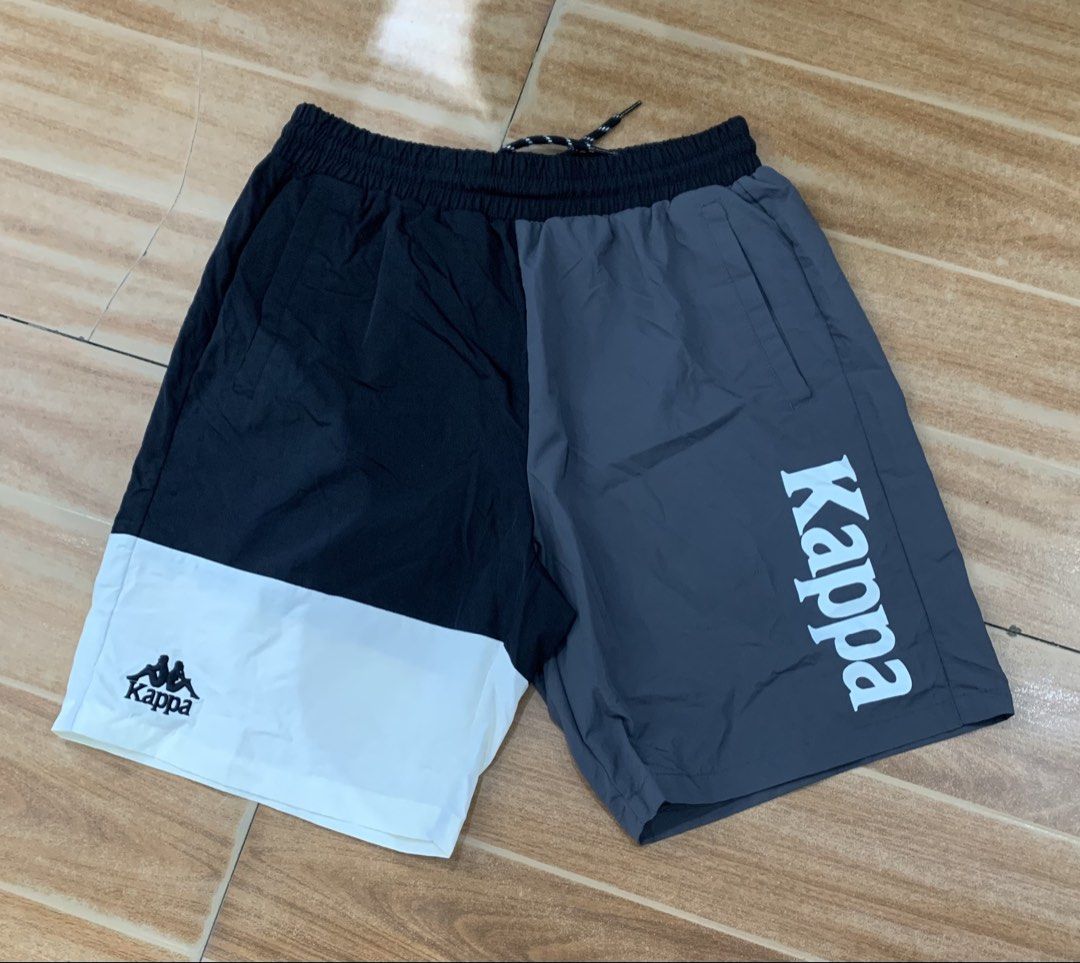 Kappa Colorblock Shorts Medium (Category: Shorts) located in Cebu City. Submitted by jkeive (Listing ID 1463964391, Image 1). Description: - Stylish Kappa colorblock shorts in black, grey, and white. - Size Medium(39-34x18) - Features the iconic Kappa logo on the front and side. - Comfortable elastic waistband with adjustable drawstring. - Versatile for both athletic activities and everyday casual wear..