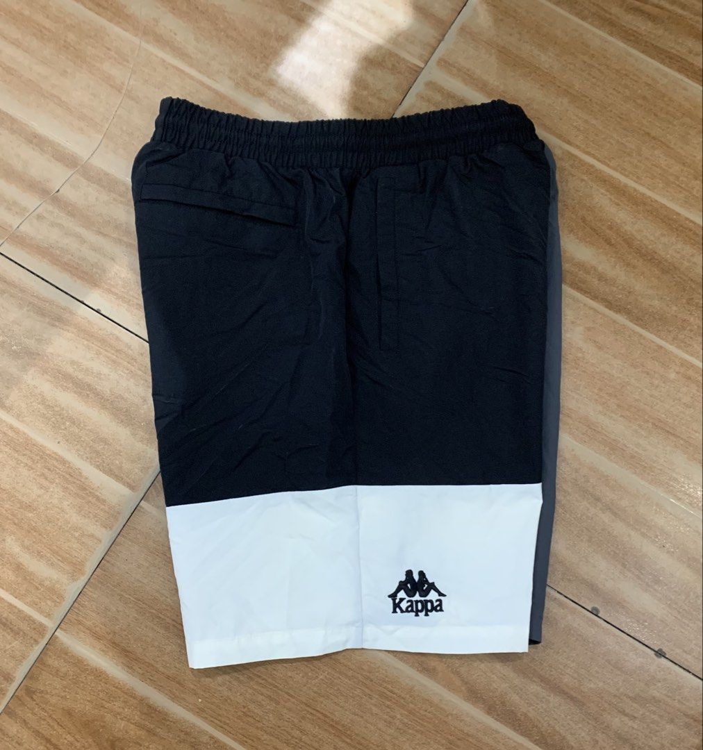 Kappa Colorblock Shorts Medium (Category: Shorts) located in Cebu City. Submitted by jkeive (Listing ID 1463964391, Image 3). Description: - Stylish Kappa colorblock shorts in black, grey, and white. - Size Medium(39-34x18) - Features the iconic Kappa logo on the front and side. - Comfortable elastic waistband with adjustable drawstring. - Versatile for both athletic activities and everyday casual wear..