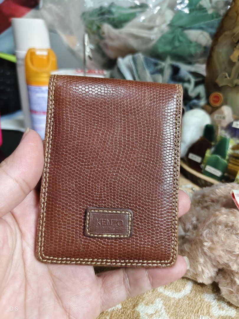 KENZO Paris Brown Leather Card Holder (Category: Wallets & Card holders) located in Lucena. Submitted by dai_suki (Listing ID 1464042047, Image 1). Description: - Genuine KENZO Paris brown leather card holder - One side features a clear window slot for easy ID/card visibility - Additional slot on the other side for extra cards - Subtle embossed KENZO logo on the front - Ideal for keeping your essential cards neatly organized.