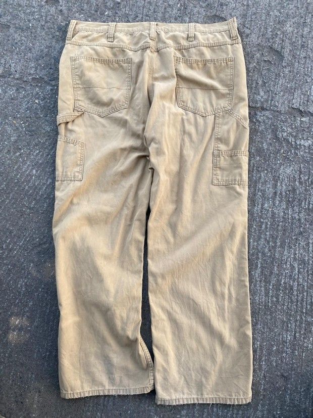 Khaki Carpenter Pants (Category: Jeans) located in Bacolod City. Submitted by carlo1019 (Listing ID 1464026317, Image 1). Description: - Khaki carpenter pants - Relaxed fit for comfort - Multiple functional pockets - Durable material built to last - Perfect for work or casual outfits - Ready for its next adventure!.