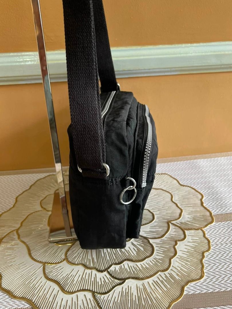 KIPLING Brand Sling or Body Bag (Category: Cross-body Bags) located in Quezon City. Submitted by bellafashion08 (Listing ID 1464076416, Image 2). Description: Dimension: - Height = 7 in. - Length = 10 in. * From U.S * Nice in actual .