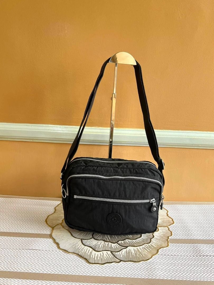 KIPLING Brand Sling or Body Bag (Category: Cross-body Bags) located in Quezon City. Submitted by bellafashion08 (Listing ID 1464076416, Image 1). Description: Dimension: - Height = 7 in. - Length = 10 in. * From U.S * Nice in actual .