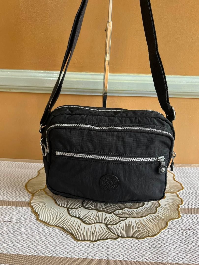 KIPLING Brand Sling or Body Bag (Category: Cross-body Bags) located in Quezon City. Submitted by bellafashion08 (Listing ID 1464076416, Image 3). Description: Dimension: - Height = 7 in. - Length = 10 in. * From U.S * Nice in actual .