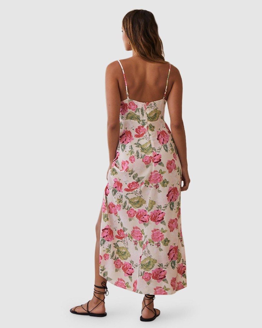 Kivari Floral Midi Dress (Category: Dresses) located in Nueva Valencia. Submitted by lululeimon (Listing ID 1464016633, Image 2). Description: Good as new Length 48 (has adjustable straps) Plain weave; non-stretch; unlined - Sweetheart neckline; tie detail - Bust keyhole cutout and tie detail - Adjustable spaghetti straps - Side hem leg split XS-S.