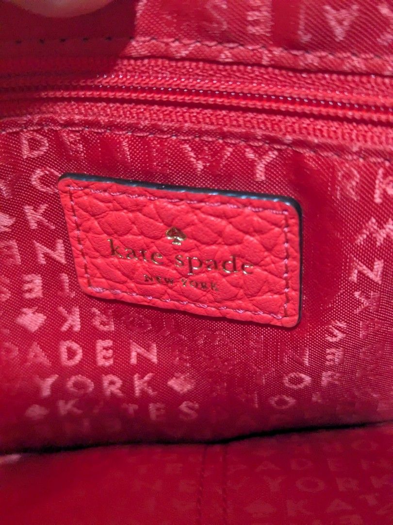 KS crossbody bag (Category: Luxury Bags & Wallets) located in Quezon City. Submitted by kuripotnya (Listing ID 1464064133, Image 3). Description: - authentic pebbled leather in crimson/red orange color - adjustable Cross body/shoulder bag - size shown in photos - scratches on hardware - clean interior - preloved excellent condition 9.8/10.