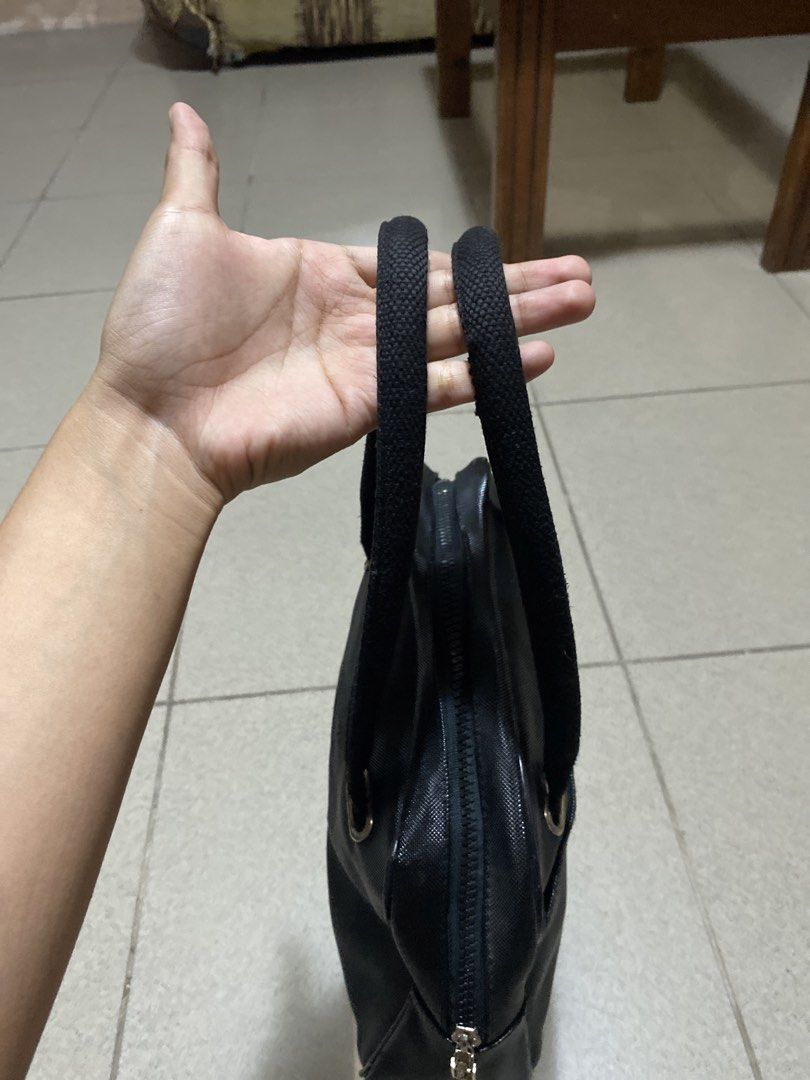 Lacoste Bowling Black Bag (Category: Shoulder Bags) located in Dagupan City. Submitted by maryennie (Listing ID 1464000104, Image 3). Description: Working zippers (all) Spacious interior Structured design Suitable for work, daily use or travel -Condition: Pre-loved, with visible signs of use .Please refer to photos for exact condition. ⭐️Selling as-is. Please inspect photos carefully before purchasing..